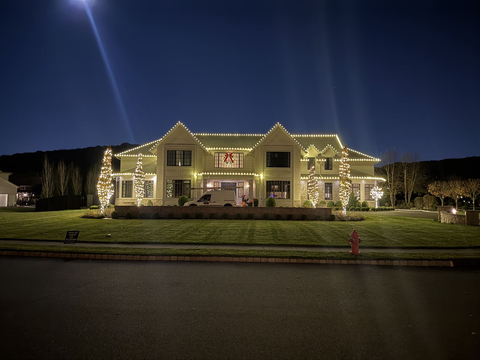 Roofline and tree lighting installation